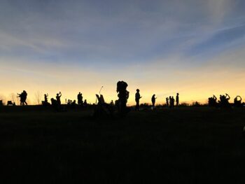 Dozens of watchers observed the 360-degree sunset and the solar eclipse from the Marion Campus prairie.