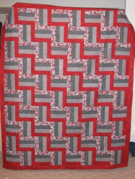 A scarlet and gray quilt 